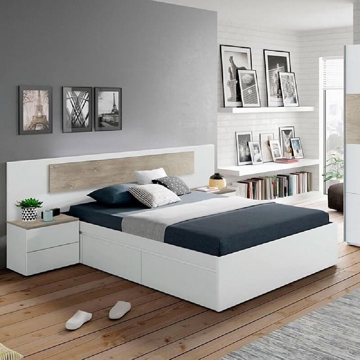 Dormitorio moderno con cama y mobiliario de guardado